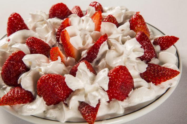 Strawberries homemade whipped cream with melon flavour